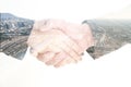 Isolated double exposure business handshake and construction