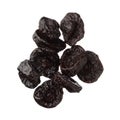 Isolated dried plums over white background, close up