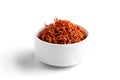 Isolated dried spice saffron in a white bowl Royalty Free Stock Photo