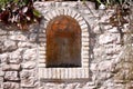 Isolated drinking fountain in the brick wall