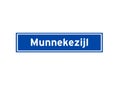 Munnekezijl isolated Dutch place name sign. City sign from the Netherlands.