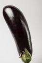 One fresh eggplant with stem isolated on white background Royalty Free Stock Photo