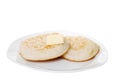 Isolated english crumpets with butter