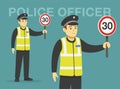 Isolated european traffic police officer holding a speed limit sign. 30 mph limit traffic sign. Royalty Free Stock Photo