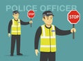 Isolated european traffic police officer holding a stop sign. Perspective front view. Royalty Free Stock Photo