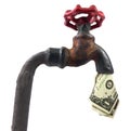 Isolated faucet with cash Royalty Free Stock Photo