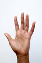 Black African indian hand showing number five, palm of hand Royalty Free Stock Photo