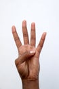 Black African indian hand showing number four Royalty Free Stock Photo