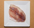 Isolated fillet of the fish (Tilapia rendalli) known as \