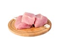 Isolated fillet of raw turkey and garlic on a wooden chopping Bo