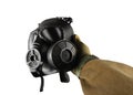 Isolated first person view military hand holding gas mask