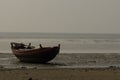 An isolated fishing boat beached on Kargil seabeach near Frezargunj, Westbengal, India
