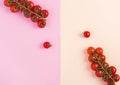 Isolated fresh red cherry tomatoes on pink-beige background. Top view. Flat lay