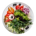 Isolated fresh vegetables platter with greens Royalty Free Stock Photo