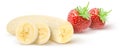 Isolated fruits. Half of banana and slices with strawberries isolated on white background, clipping path. Royalty Free Stock Photo