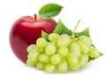 Isolated fruits. Red apple fruit and green (yellow) grapes with leaves isolated on white background with clipping path. Royalty Free Stock Photo