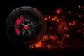 Isolated generic sport car wheel with yellow breaks drifting blazing flames of fire in motion Royalty Free Stock Photo