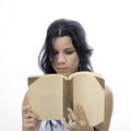 Isolated girl reading a book Royalty Free Stock Photo