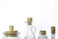 Isolated glass jars and bottles with cork lids Royalty Free Stock Photo