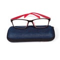 Isolated of glasses in blue jean case on white background. Royalty Free Stock Photo