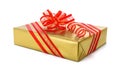 Isolated gold gift box with red bow Royalty Free Stock Photo