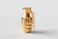 Isolated golden hand grenade with white background Royalty Free Stock Photo