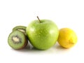 Isolated green apple, kiwi and yellow lemon Royalty Free Stock Photo