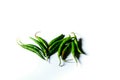 Isolated green chilis placed in a white background with space for text in the right Royalty Free Stock Photo