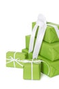 Isolated green giftboxes tied with white ribbon Royalty Free Stock Photo