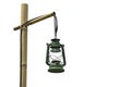 Isolated Green Lantern hanging on bamboo poles on a white background with clipping path Royalty Free Stock Photo