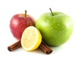 Isolated green and red apples, lemon with cinnamon Royalty Free Stock Photo