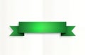 Isolated green ribbon banner on white background. Modern design element for various uses. Suitable for graphic design projects. Royalty Free Stock Photo