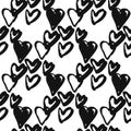 Isolated grunge seamless pattern with heart silhouettes. Hand drawn black love shapes on white background. Monochrome design Royalty Free Stock Photo