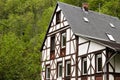 Isolated half-timbered house in the forest Moselkern, Germany