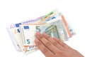 Isolated hand on Euro banknotes on white background Royalty Free Stock Photo