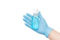hand with gloves uses an alcohol-based liquid sanitizer that kills most types of microbes and viruses. Covid and Royalty Free Stock Photo