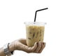 Isolated Hand holding a glass of cold espresso coffee on a white background with clipping path Royalty Free Stock Photo