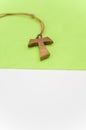 isolated hand made wooden tau cross pendant - Greek letter tau