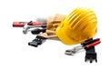 Isolated hard hat with tools and blueprint on whit Royalty Free Stock Photo