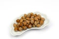 Isolated haselnuts on cap Royalty Free Stock Photo
