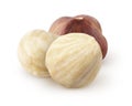 Isolated hazelnuts. Whole raw and two peeled hazelnut isolated on white Royalty Free Stock Photo