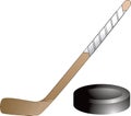 Isolated hockey puck and stick Royalty Free Stock Photo