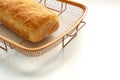An isolated homemade white bread on a cooling rack on white table Royalty Free Stock Photo