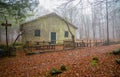 Isolated house in the beeches forest in Autumn. Royalty Free Stock Photo