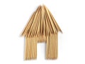 Isolated house made of toothpicks on white background