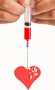 Isolated hypodermic syringe with heart shape