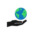 Isolated icon of green planet, earth in black hand on white background. Color globe and hand. Symbol of care, protection. Save Royalty Free Stock Photo