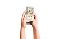 Isolated image of female hands counting dollars on white background. Top view of salary and wages concept