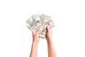 Isolated image of female hands counting dollars on white background. Top view of salary and wages concept