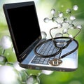 Isolated image of laptop and stethoscope Royalty Free Stock Photo